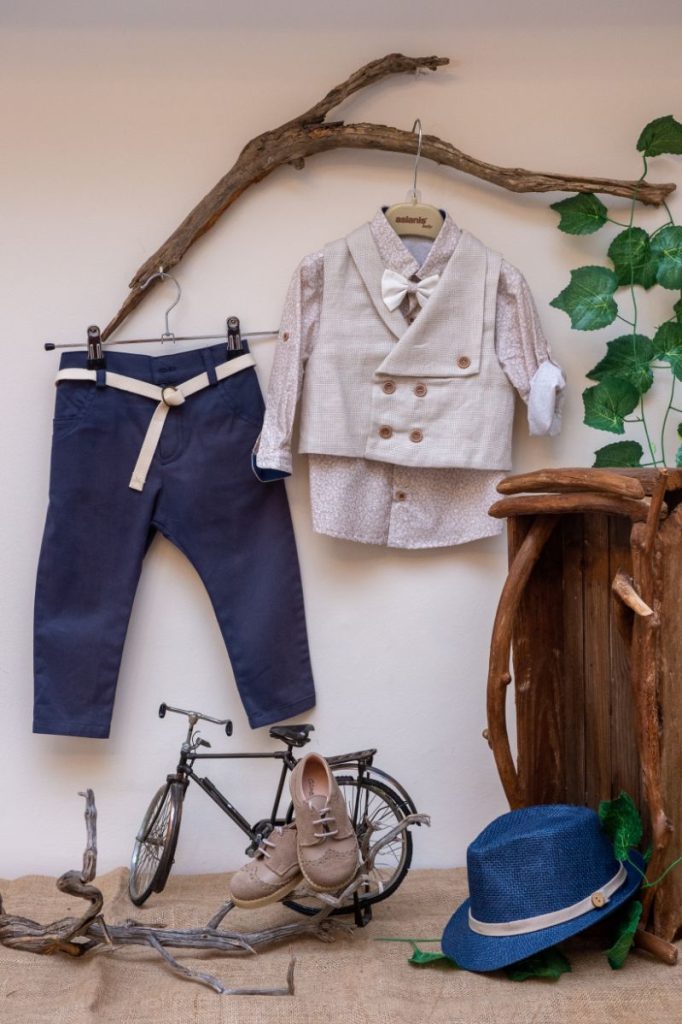 Elegant and modern christening set made of blue fabric pants