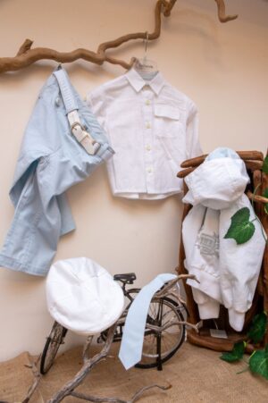 Elegant and modern christening GuyLaroche set from light blue pants