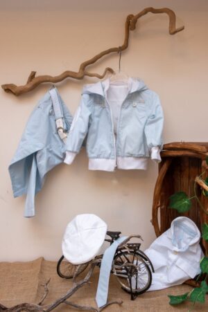Elegant and modern christening GuyLaroche set from light blue pants